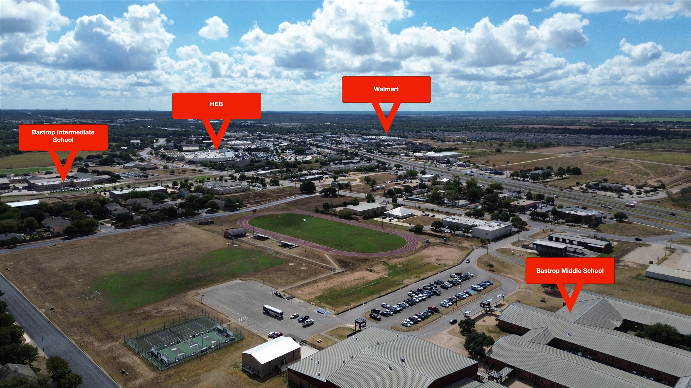 745 Caylor Cove Bastrop, TX 78602 - Photo 36 of 40 This prime Bastrop location offers easy access to Walmart, HEB, and Highway 71, making commuting to Houston or Austin simple. Nearby, you’ll find major employers like SpaceX, Boring Company, and Tesla, as well as schools, combining convenience and lifestyle. Ideal for buyers searching for a Bastrop home for sale in a central location with access to shopping, dining, and employment hubs, this property puts everything you need within reach.