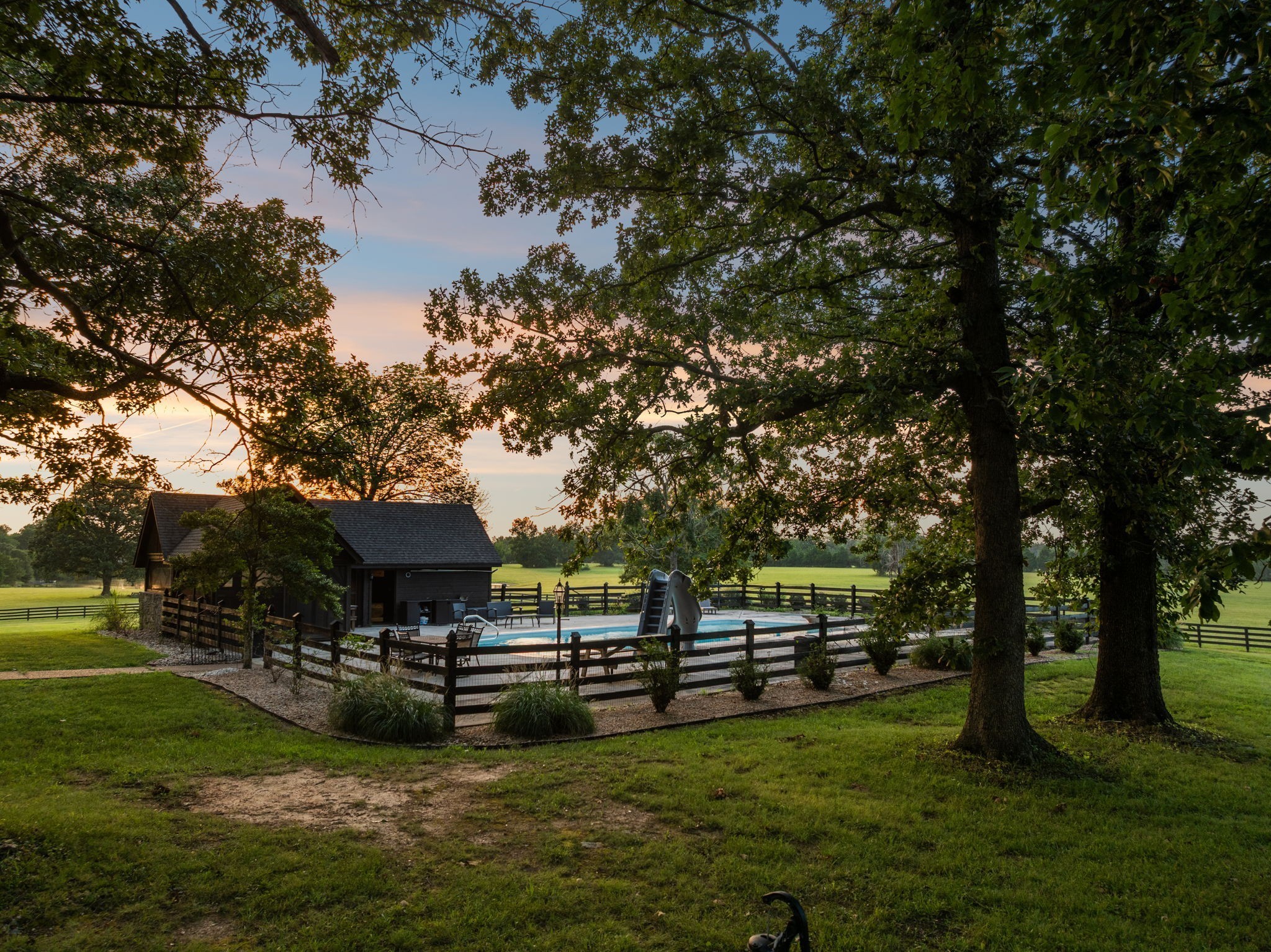 6040 South Mt Juliet Road Hermitage, TN 37076 - Photo 10 of 26 a view of a house with garden and sitting area