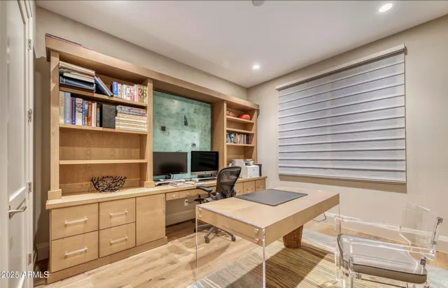 a workspace with furniture and window