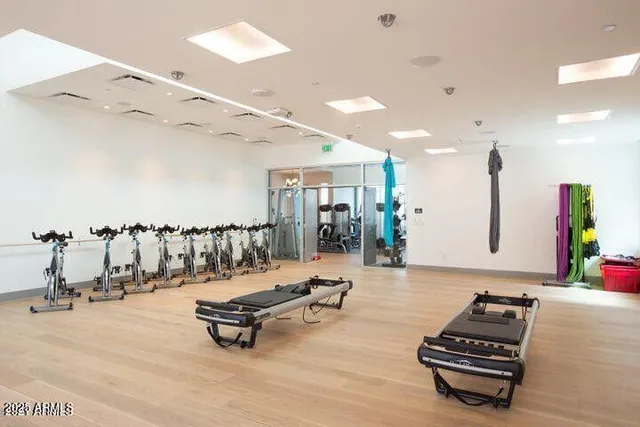 a patio with table and chairs