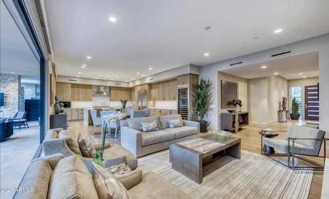 a living room with furniture and a table