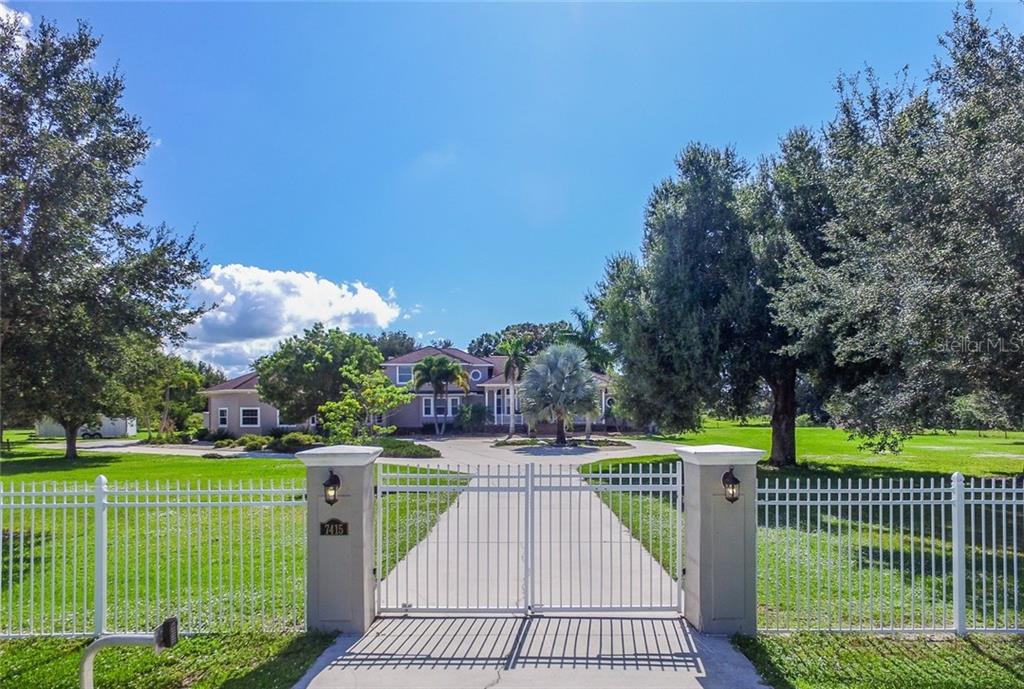 7415 Riverside Drive Punta Gorda, FL 33982 - Photo 1 of 1 a view of a park with large trees