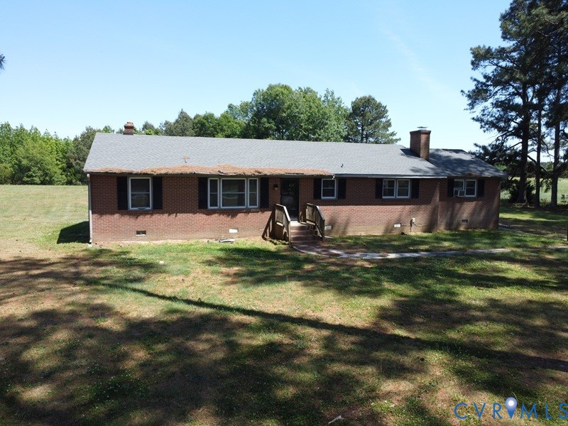 10024 South Hill Road Kenbridge, VA 23944 - Photo 1 of 32 a view of a house with pool and chairs