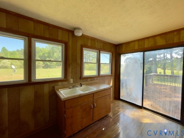 10024 South Hill Road Kenbridge, VA 23944 - Photo 11 of 32 a bathroom with a granite countertop sink and large window