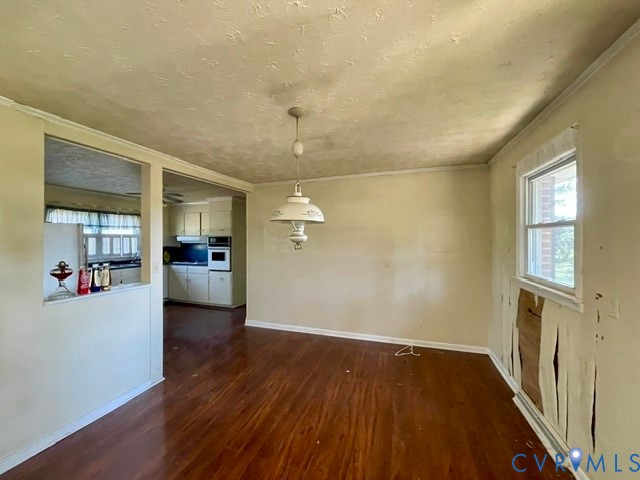 10024 South Hill Road Kenbridge, VA 23944 - Photo 6 of 32 wooden floor in an empty room and a kitchen
