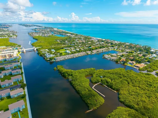 a view of a lake with a yard