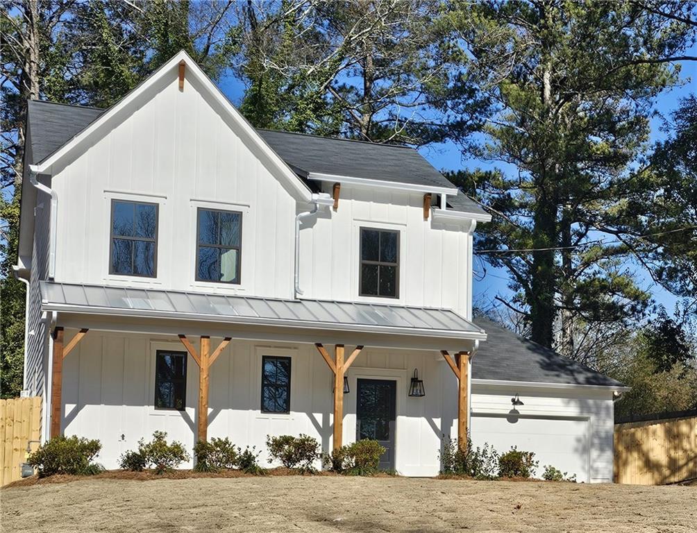 2480 Ousley Court Decatur, GA 30032 - Photo 1 of 1 a view of a white house with large windows