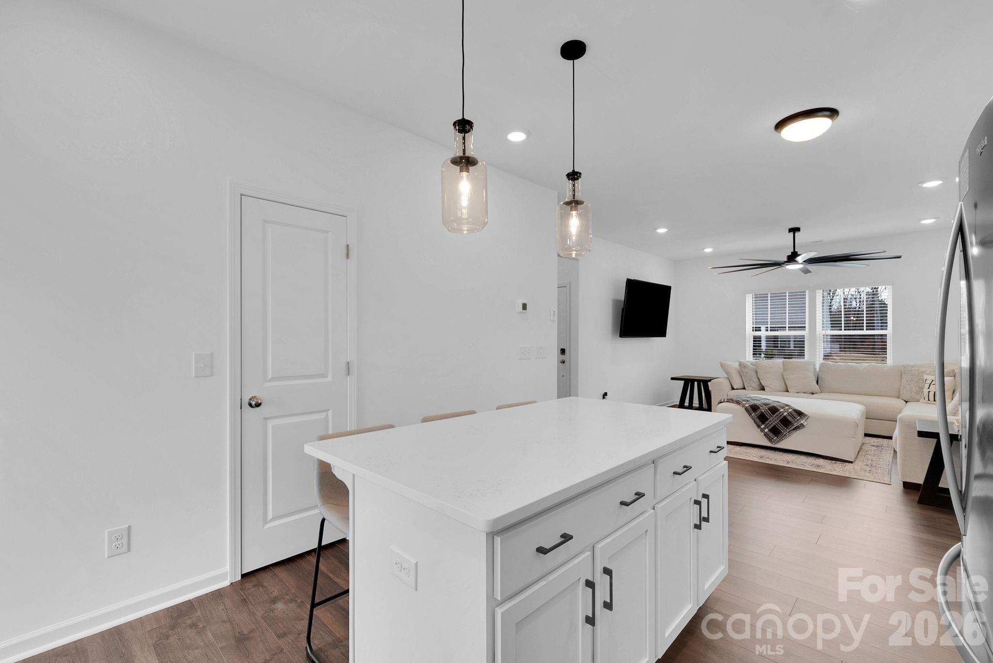 175 Aspire Circle Wingate, NC 28174 - Photo 4 of 24 a view of a living room and chandelier