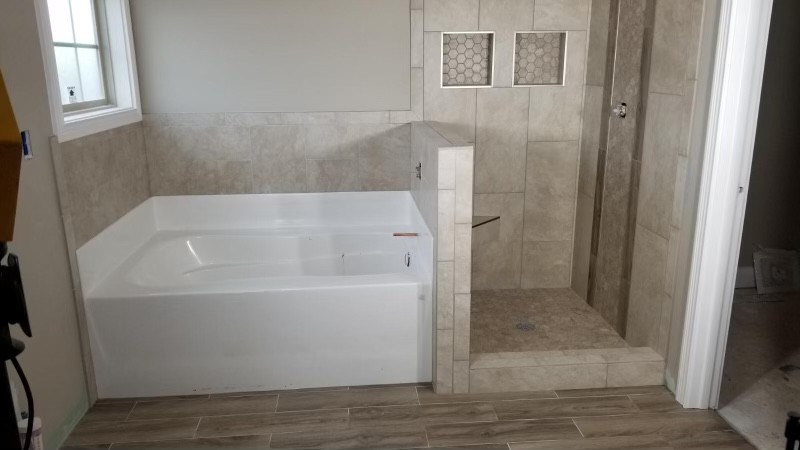 3996 Highway 49 West Springfield, TN 37172 - Photo 13 of 22 a white bath tub sitting next to a shower