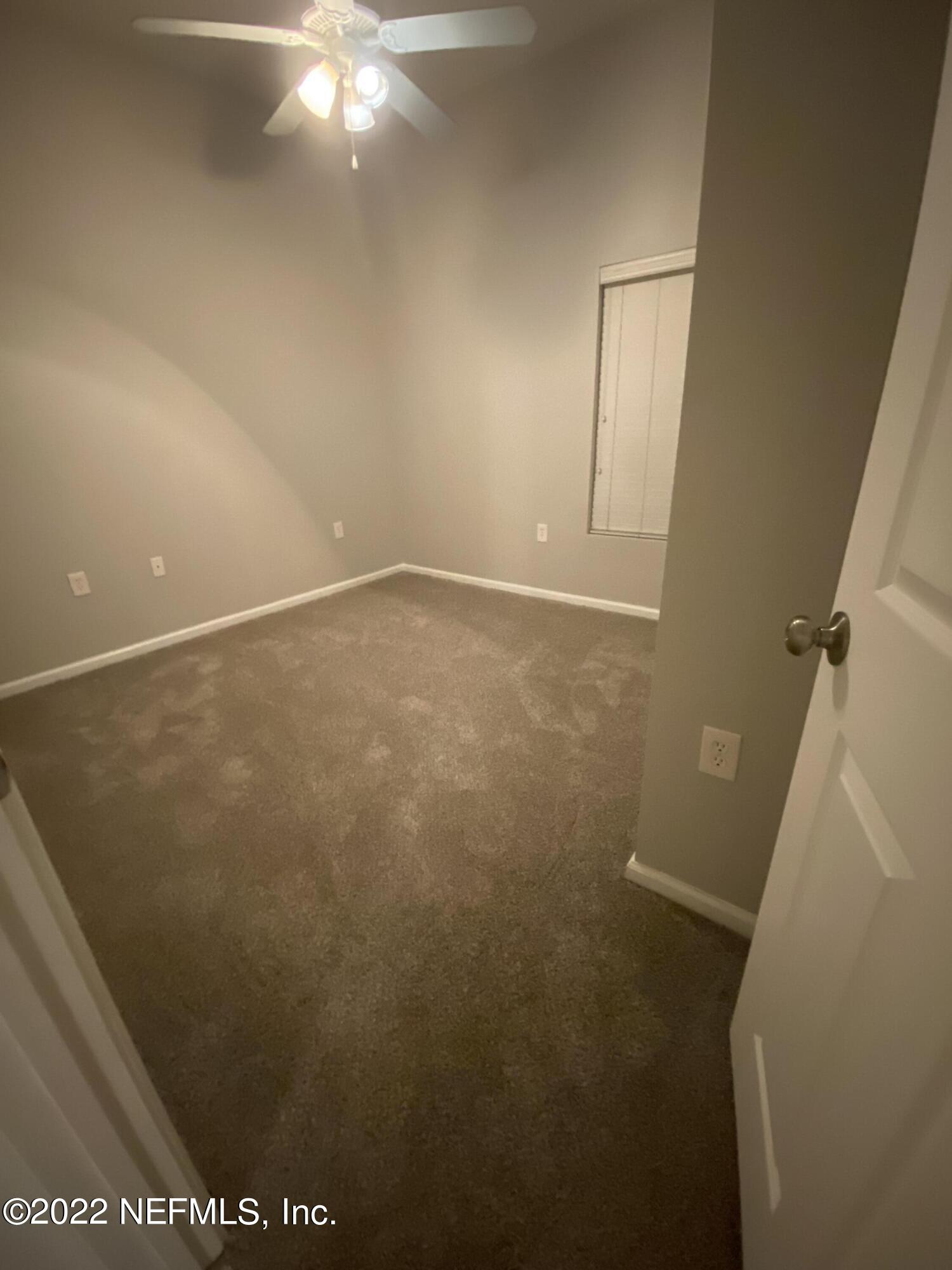 7920 Merrill Road, Unit 101 Jacksonville, FL 32277 - Photo 13 of 14 a view of an empty room
