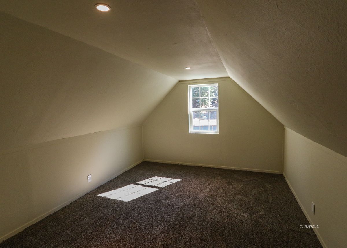 25585 Seneca Road Idyllwild, CA 92549 - Photo 12 of 24 an empty room with a empty space and a window