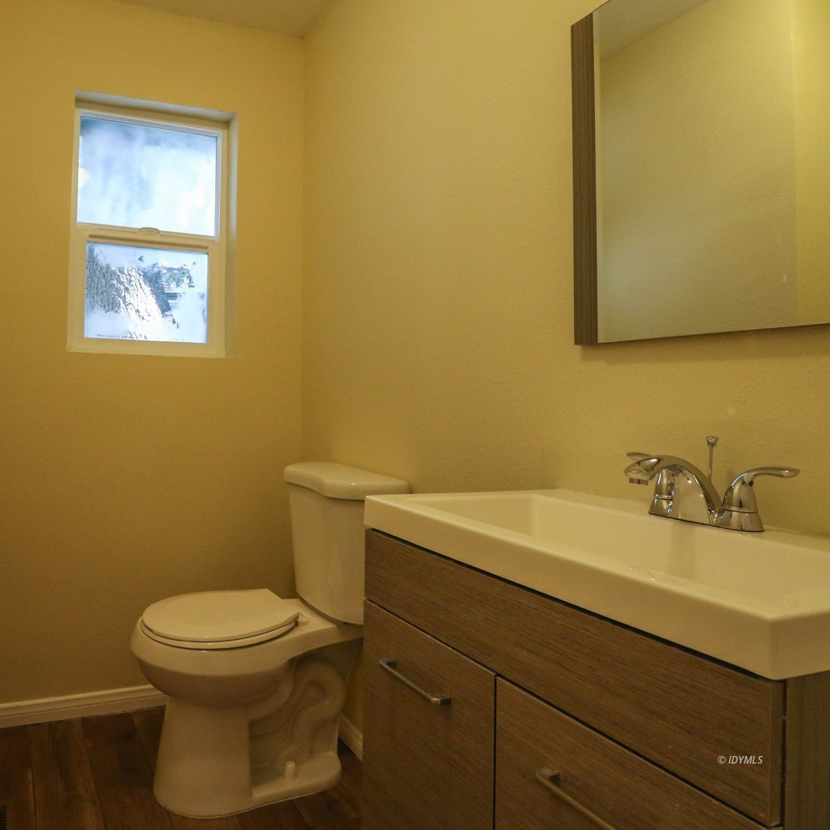 25585 Seneca Road Idyllwild, CA 92549 - Photo 8 of 24 a bathroom with a sink mirror vanity and toilet