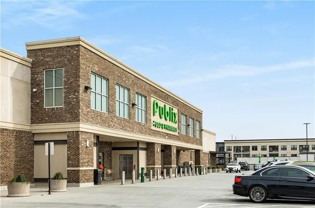 a view of a car park in front of a building