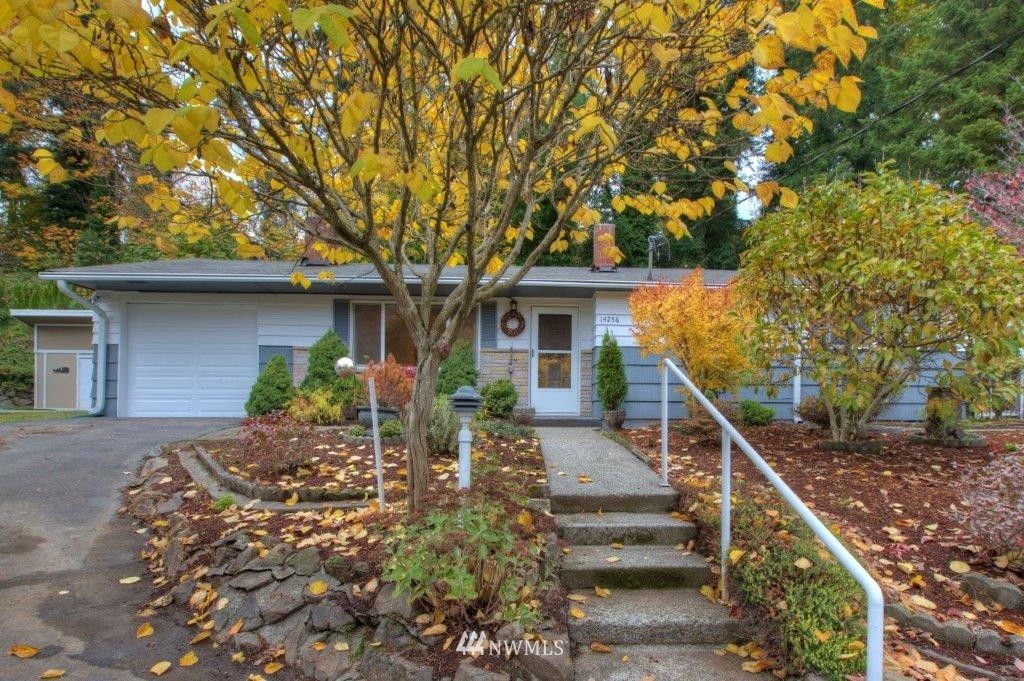 14256 Southeast Allen Rd. Bellevue, WA 98006 - Photo 1 of 1 a front view of house with deck and yard