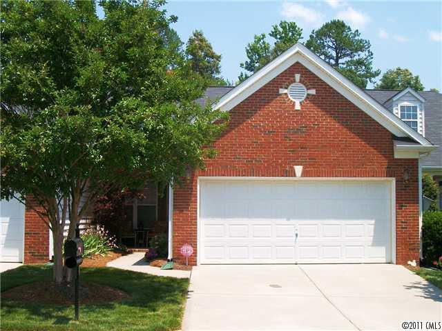 1671 Onyx Ridge, Unit 1671 Fort Mill, SC 29708 - Photo 1 of 15 front view of a house with a yard