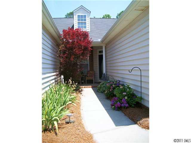 1671 Onyx Ridge, Unit 1671 Fort Mill, SC 29708 - Photo 15 of 15 a view of a house with a backyard