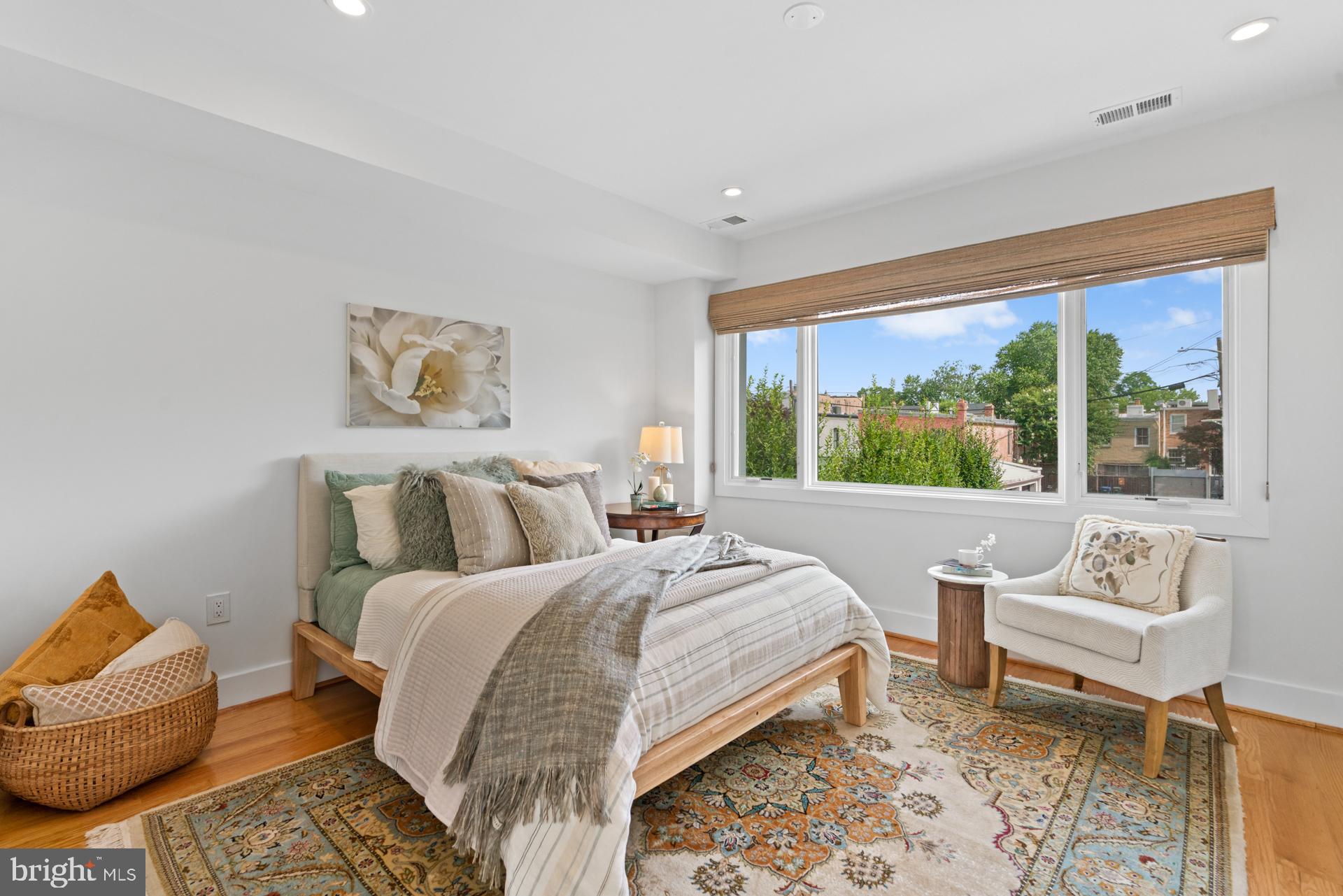 320 A Street Northeast Washington, DC 20002 - Photo 12 of 36 a bed room with a bed and a couch