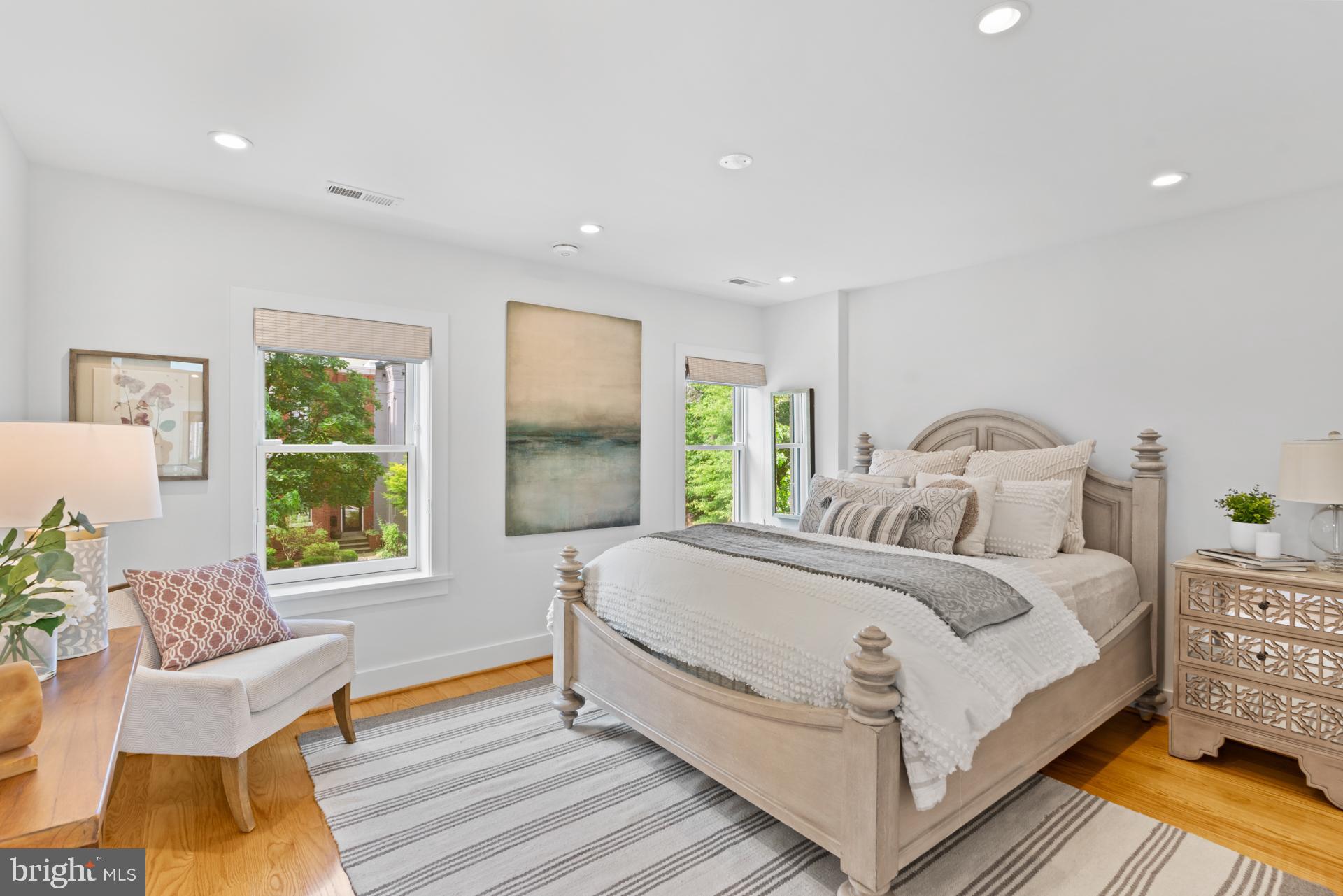 320 A Street Northeast Washington, DC 20002 - Photo 18 of 36 a bedroom with a bed and a couch