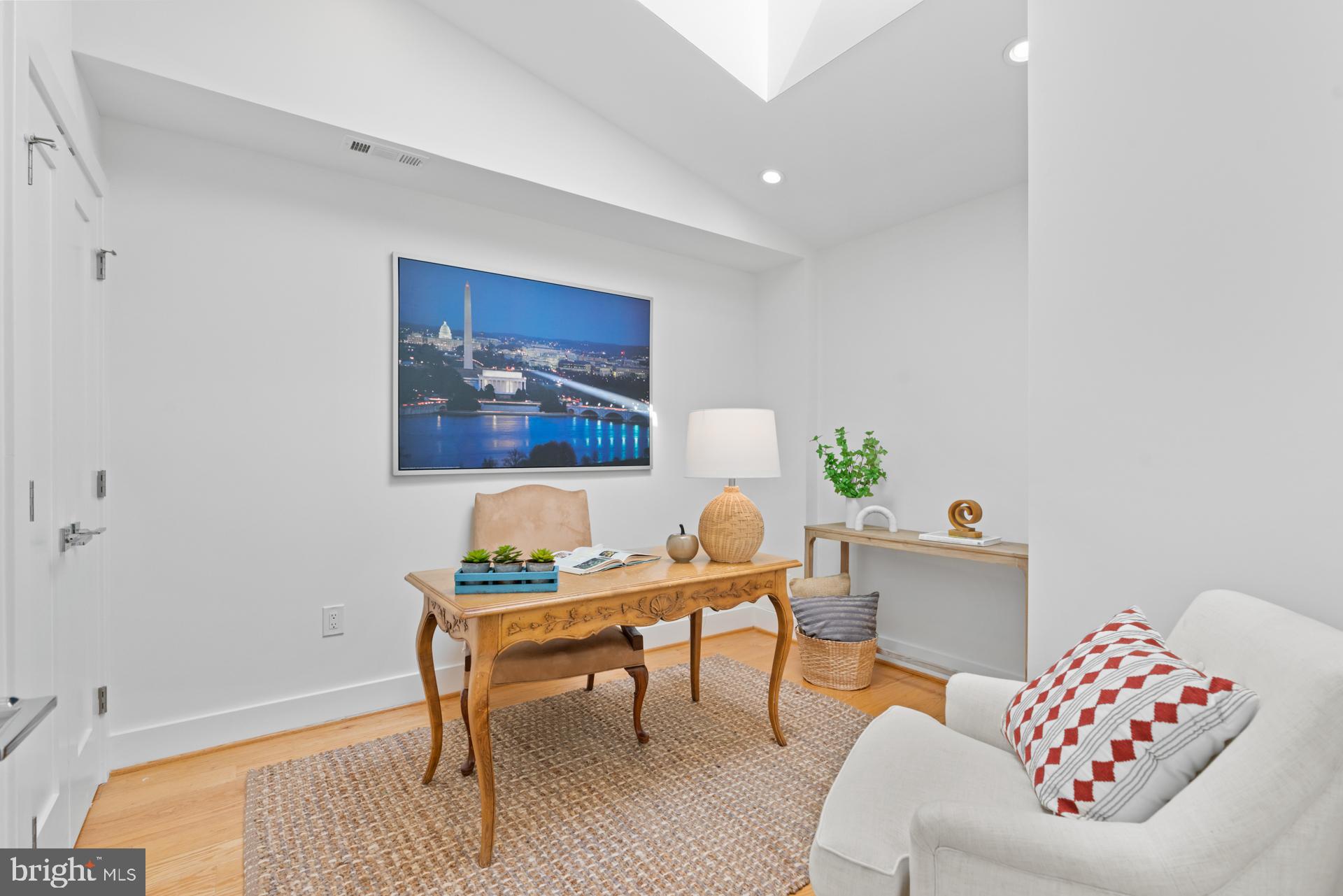 320 A Street Northeast Washington, DC 20002 - Photo 21 of 36 a living room with furniture and a table