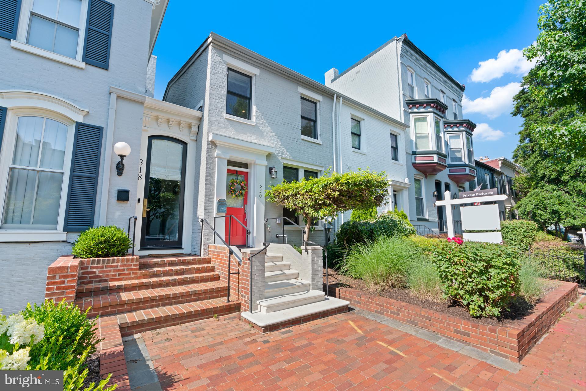 320 A Street Northeast Washington, DC 20002 - Photo 35 of 36 a front view of a house with a garden