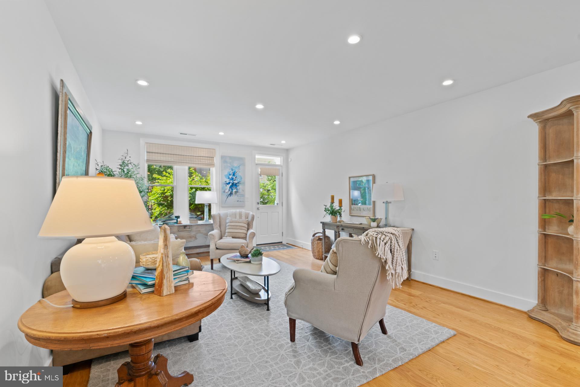320 A Street Northeast Washington, DC 20002 - Photo 7 of 36 a living room with furniture and a wooden floor