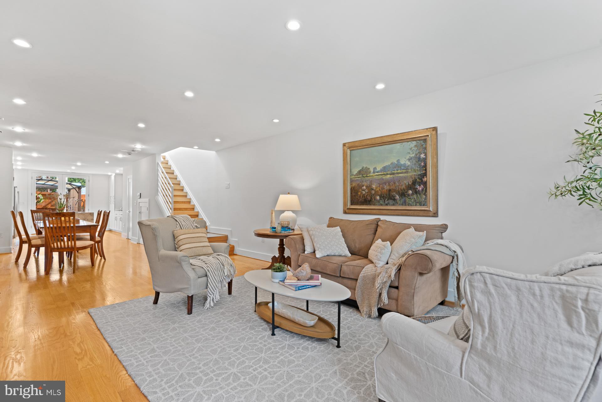 320 A Street Northeast Washington, DC 20002 - Photo 8 of 36 a living room with furniture and a wooden floor