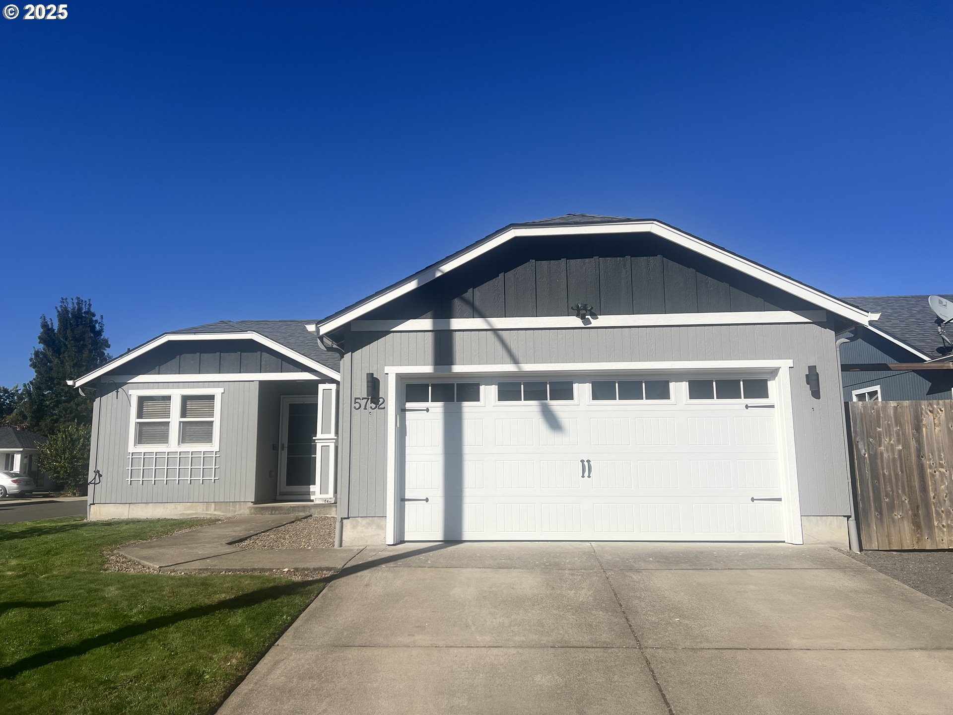 5752 Mica Street Springfield, OR 97478 - Photo 4 of 45 a front view of a house with a yard