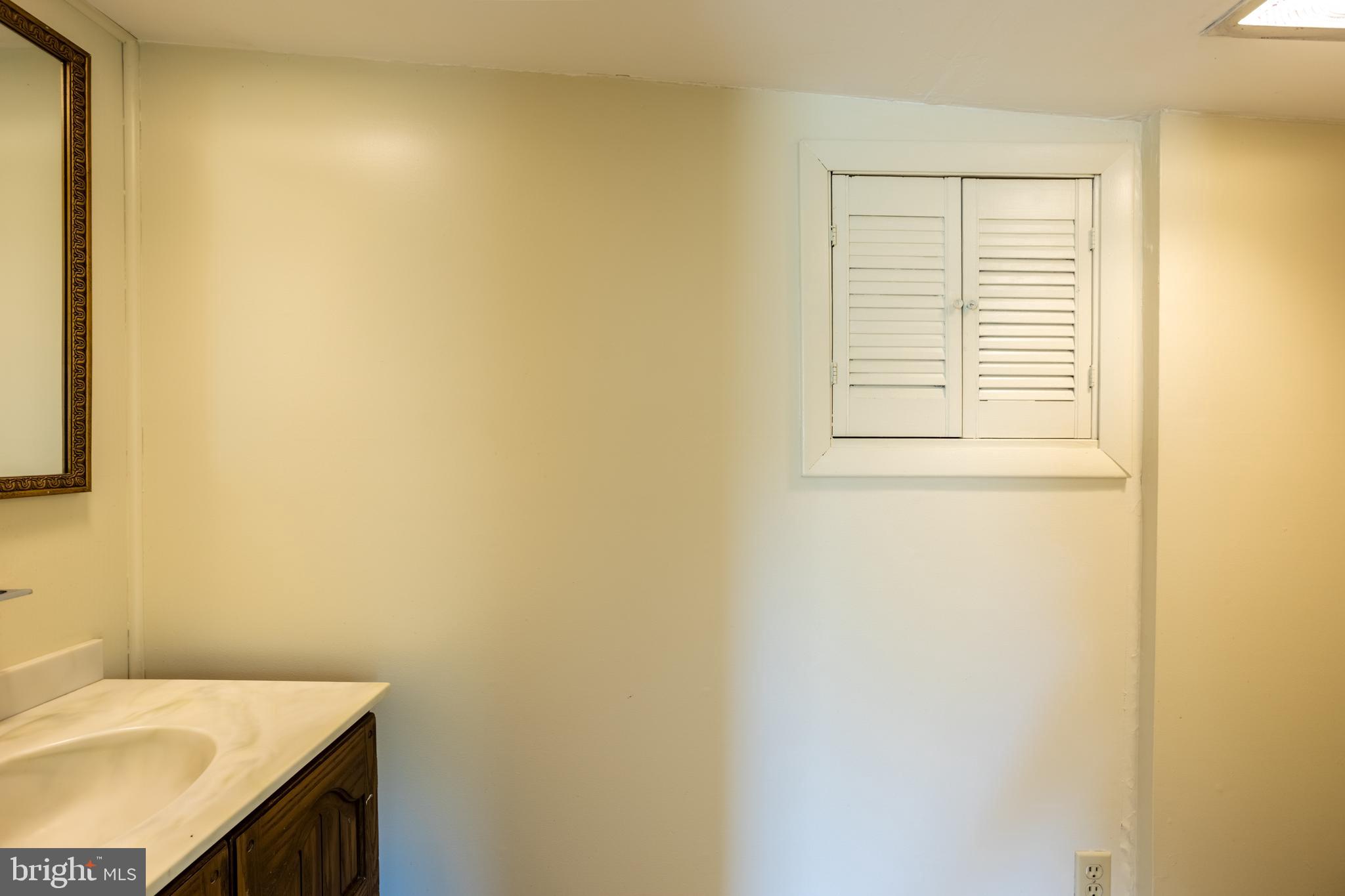 3612 Churchville Road Aberdeen, MD 21001 - Photo 24 of 49 a bathroom with a sink and a mirror