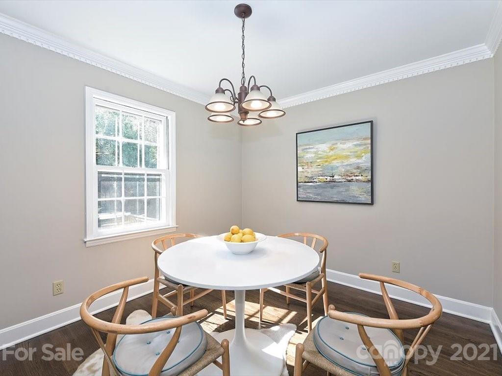 6918 Windyrush Road Charlotte, NC 28226 - Photo 7 of 26 a view of a dining room and a table in a room