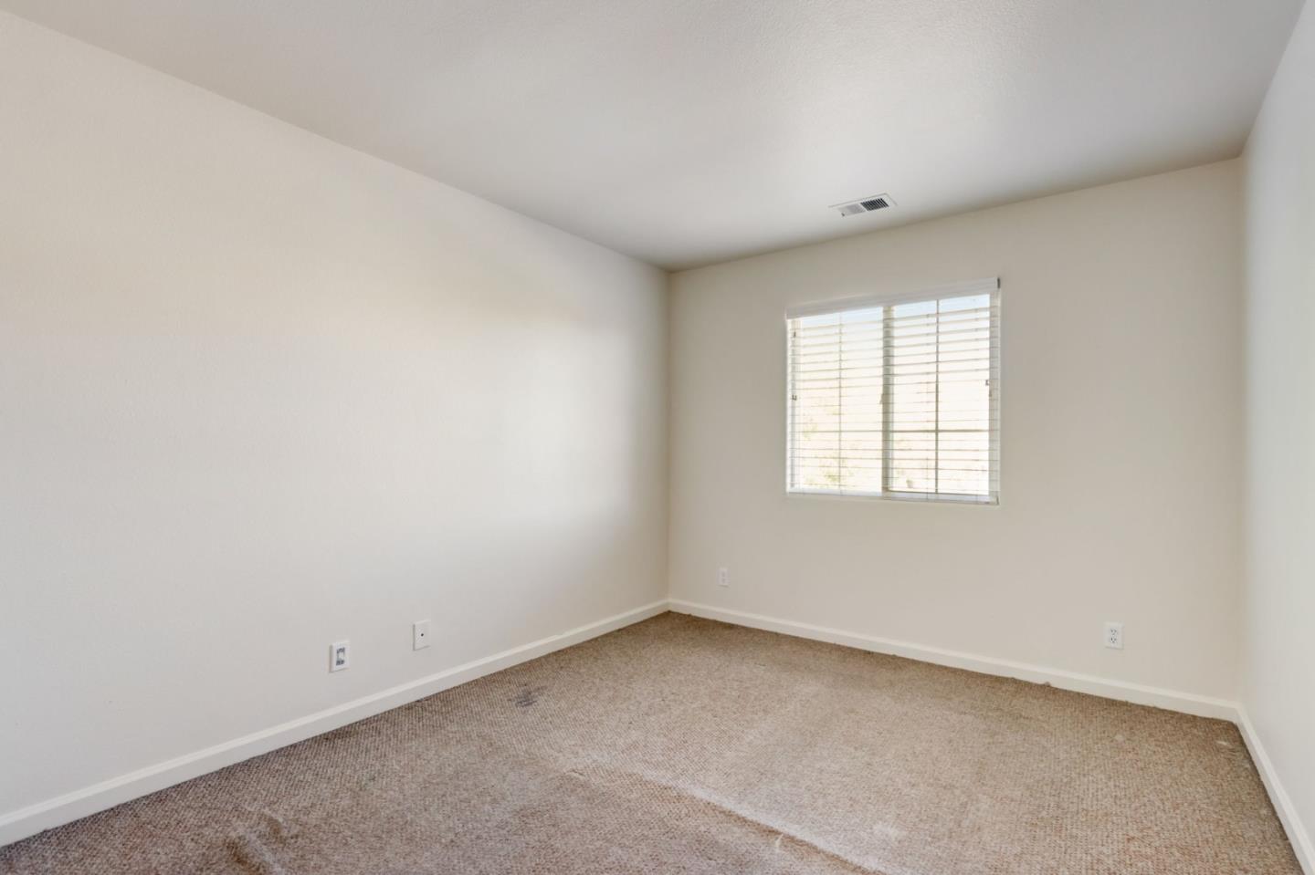 8911 Del Rio Circle Gilroy, CA 95020 - Photo 18 of 29 an empty room with a window