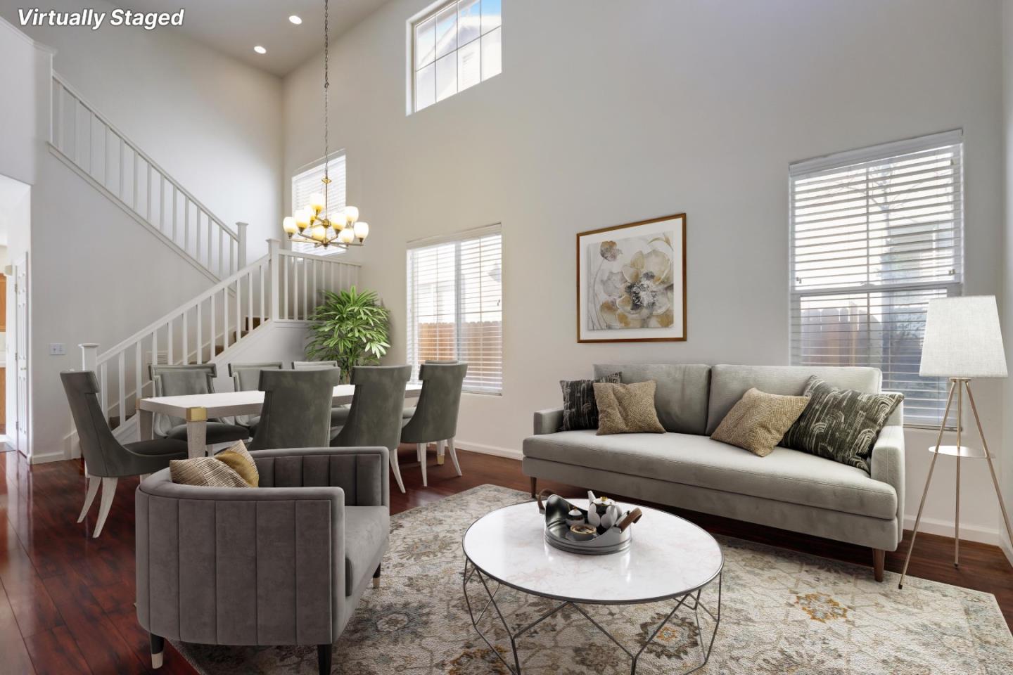8911 Del Rio Circle Gilroy, CA 95020 - Photo 4 of 29 a living room with furniture and a dining table with wooden floor