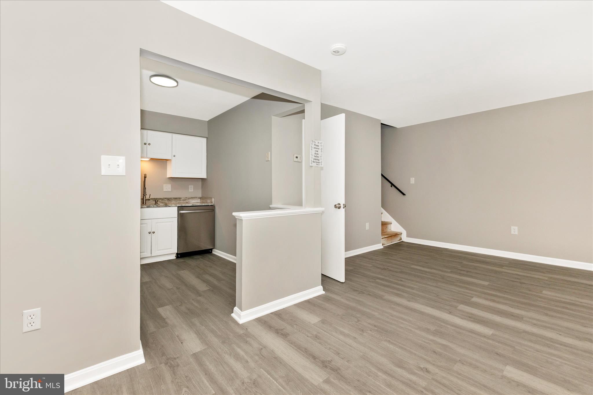 2861 Shepperton Terrace Silver Spring, MD 20904 - Photo 13 of 44 a view of a kitchen with wooden floor and electronic appliances