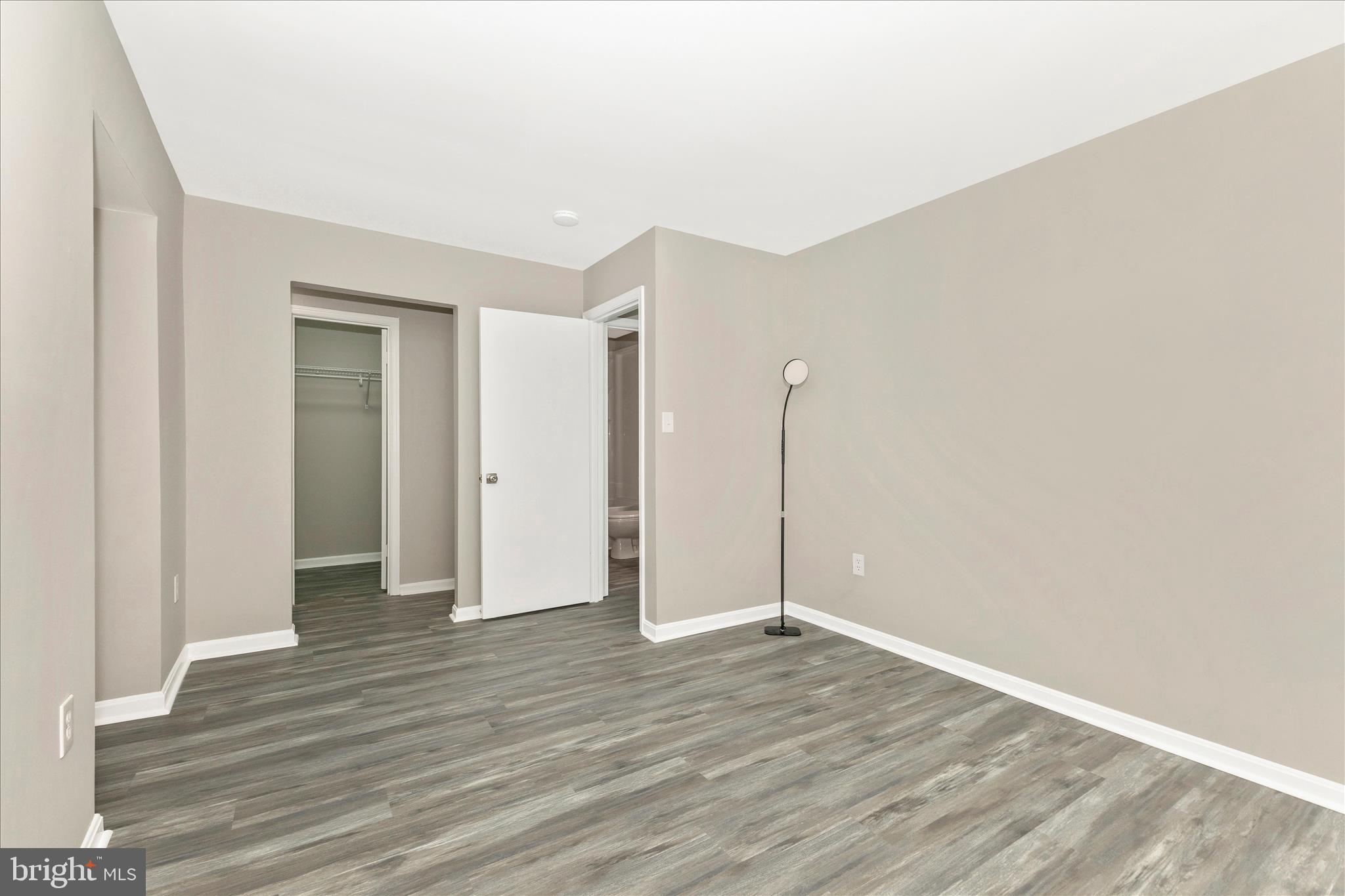 2861 Shepperton Terrace Silver Spring, MD 20904 - Photo 23 of 44 a view of an empty room with wooden floor