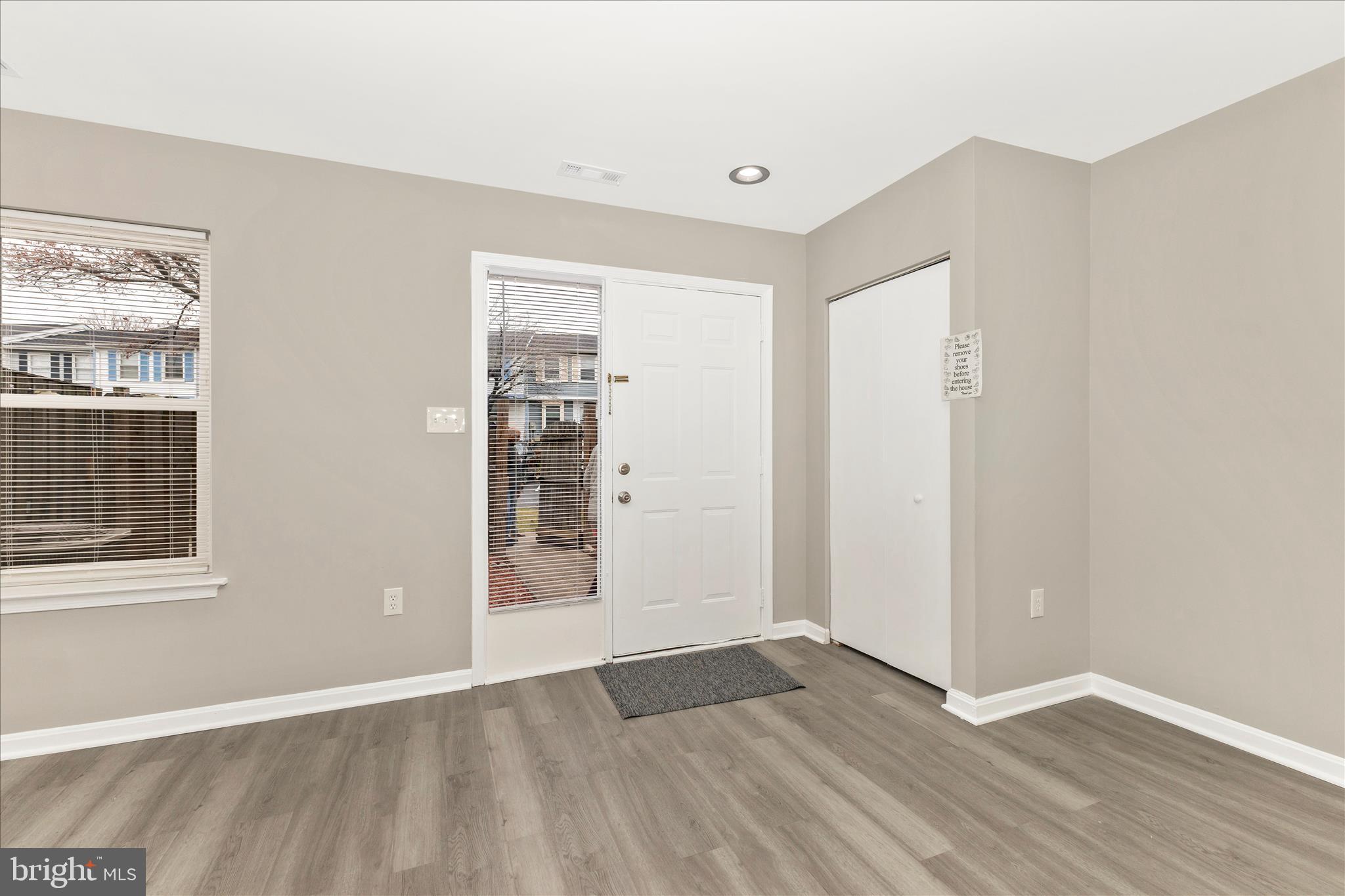 2861 Shepperton Terrace Silver Spring, MD 20904 - Photo 3 of 44 an empty room with wooden floor and windows