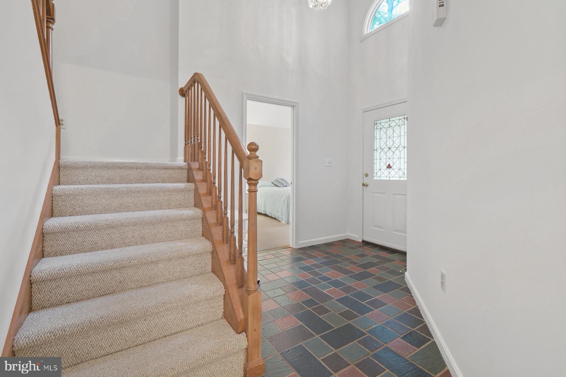 70 Capetown Road Ocean Pines, MD 21811 - Photo 5 of 48 Inviting entryway with elegant staircase.