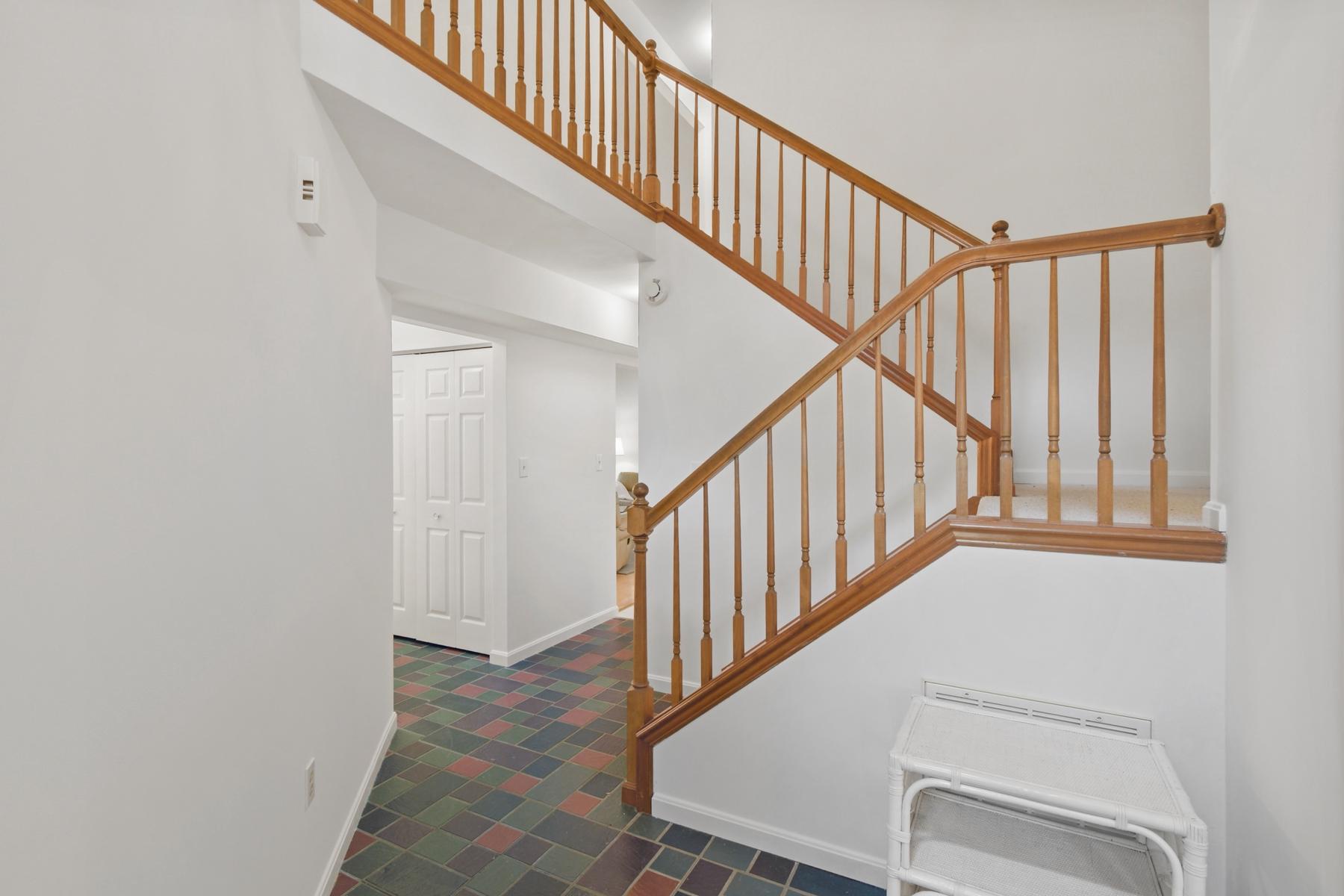 70 Capetown Road Ocean Pines, MD 21811 - Photo 6 of 48 Two-story foyer with elegant staircase.