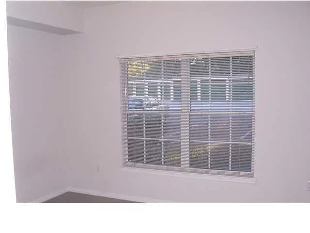 a black and white photo of a living room