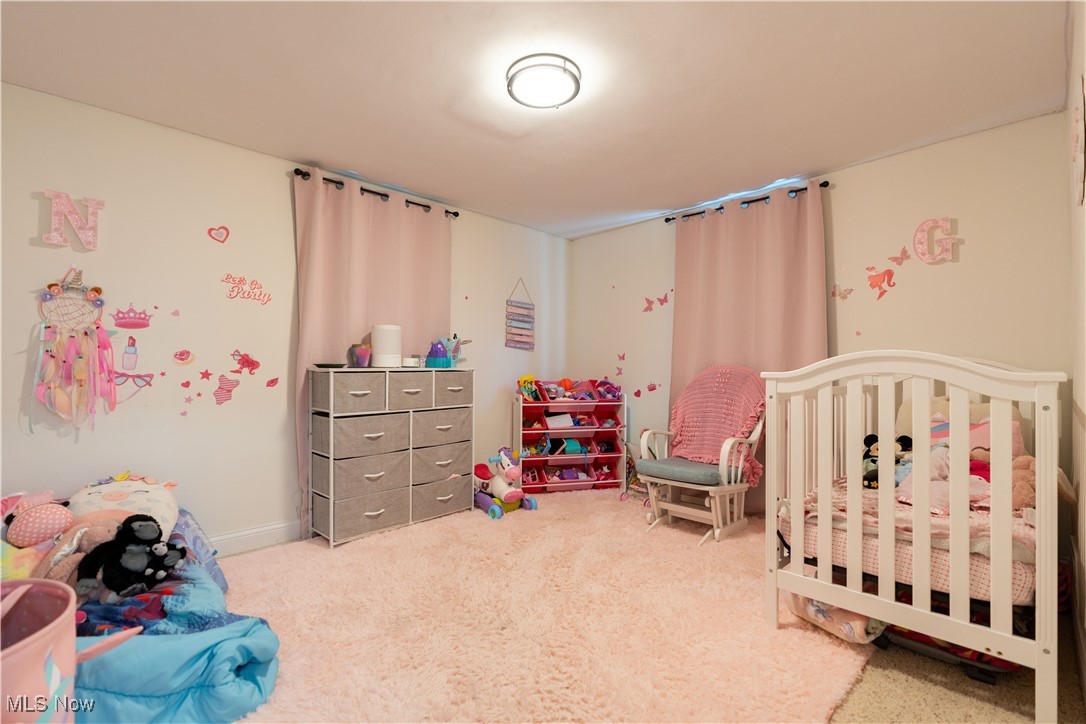 3316 Wadsworth Road Barberton, OH 44203 - Photo 22 of 36 2nd Bedroom with a nursery area and carpet