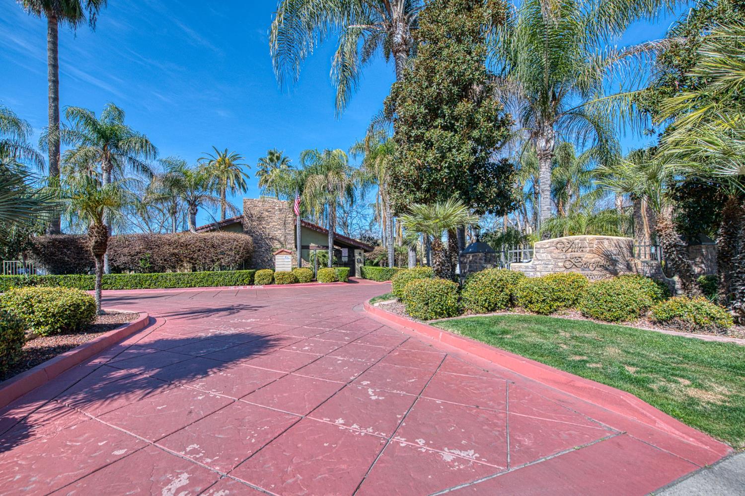 2881 Huntington Boulevard, Unit 262 Fresno, CA 93721 - Photo 1 of 31 a sidewalk with a building in the background