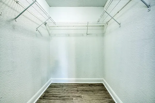 a view of a room with racks on the wall