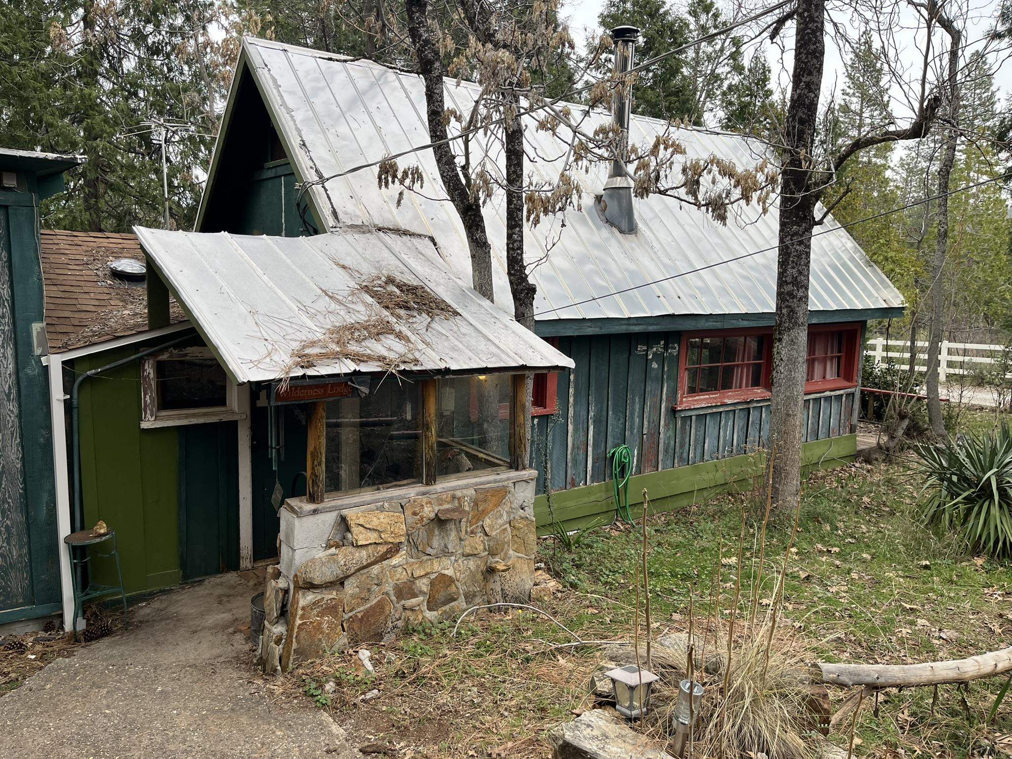 23090 North Bald Mountain Road Sonora, CA 95370 - Photo 50 of 59 Rear view of property with a metal roof