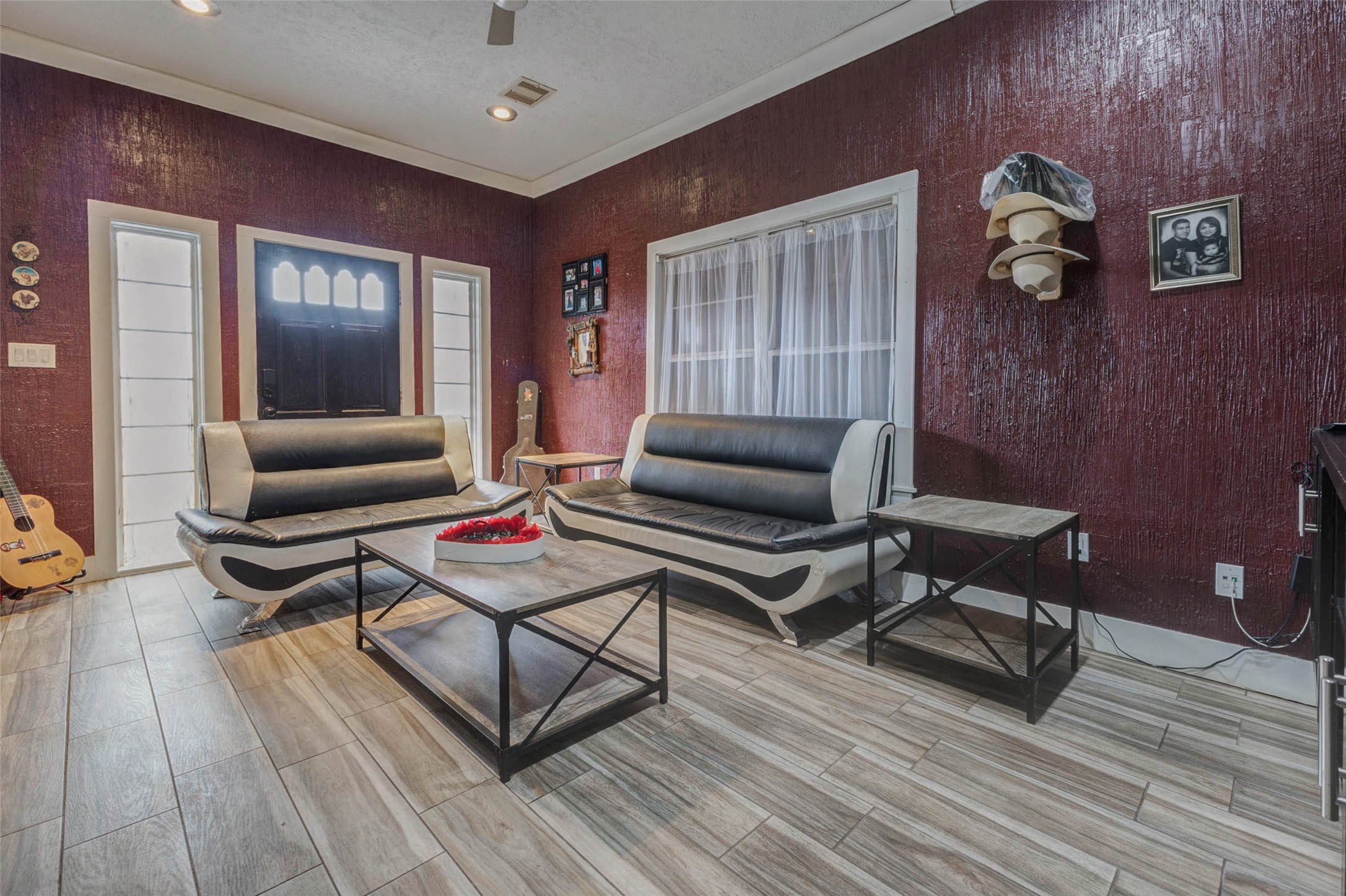 4008 Colvin Street Houston, TX 77013 - Photo 15 of 28 a living room with furniture and a wooden floor