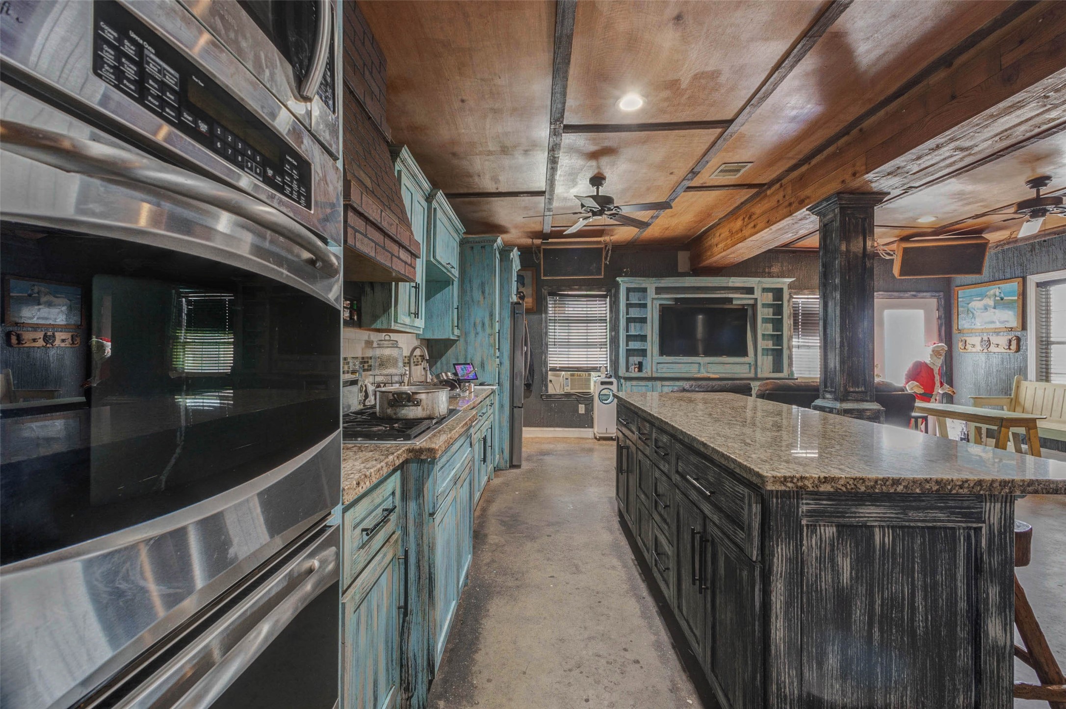 4008 Colvin Street Houston, TX 77013 - Photo 16 of 28 a kitchen with stainless steel appliances granite countertop a stove and a sink