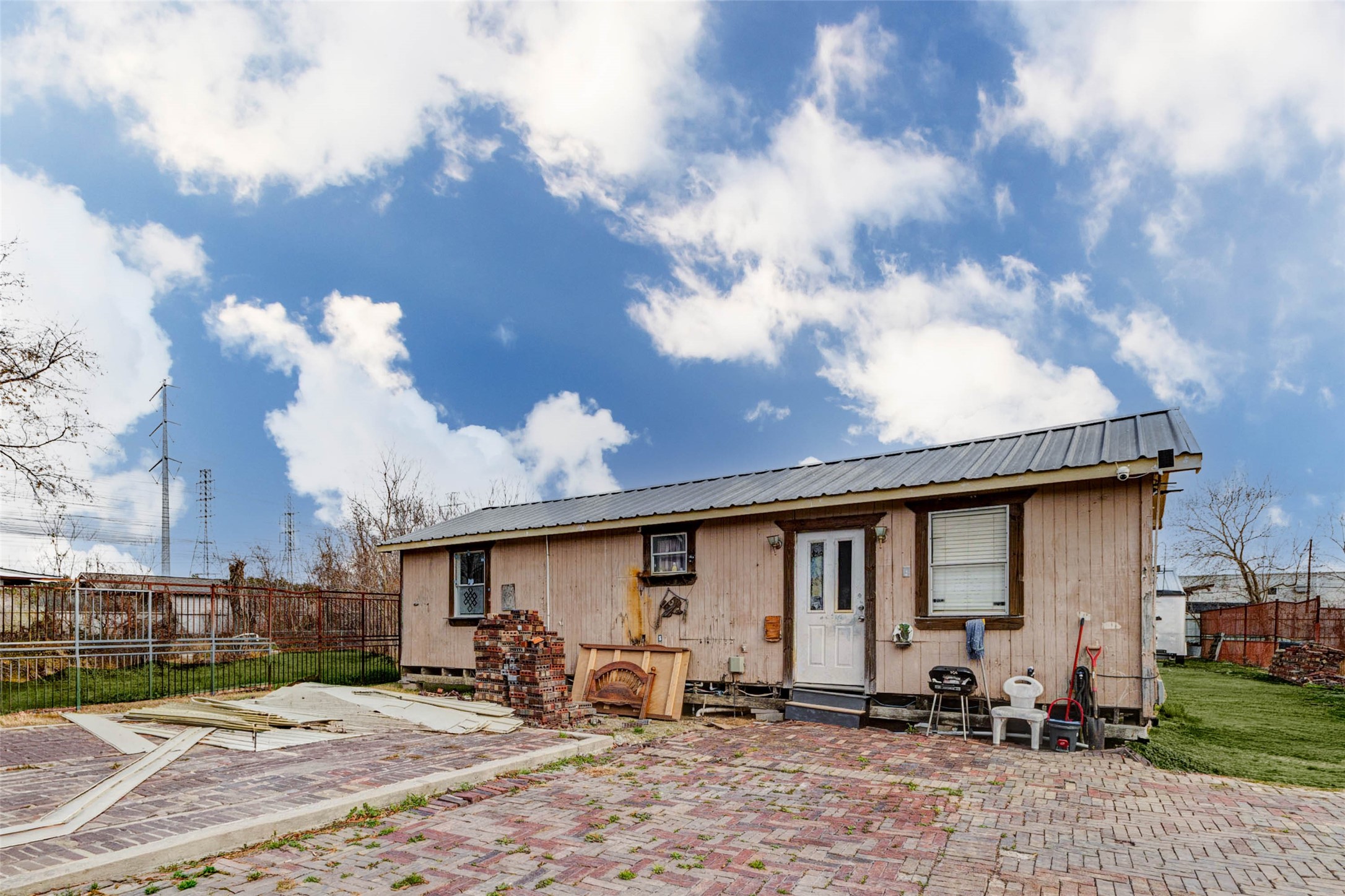 4008 Colvin Street Houston, TX 77013 - Photo 18 of 28 a view of a backyard with sitting area and furniture