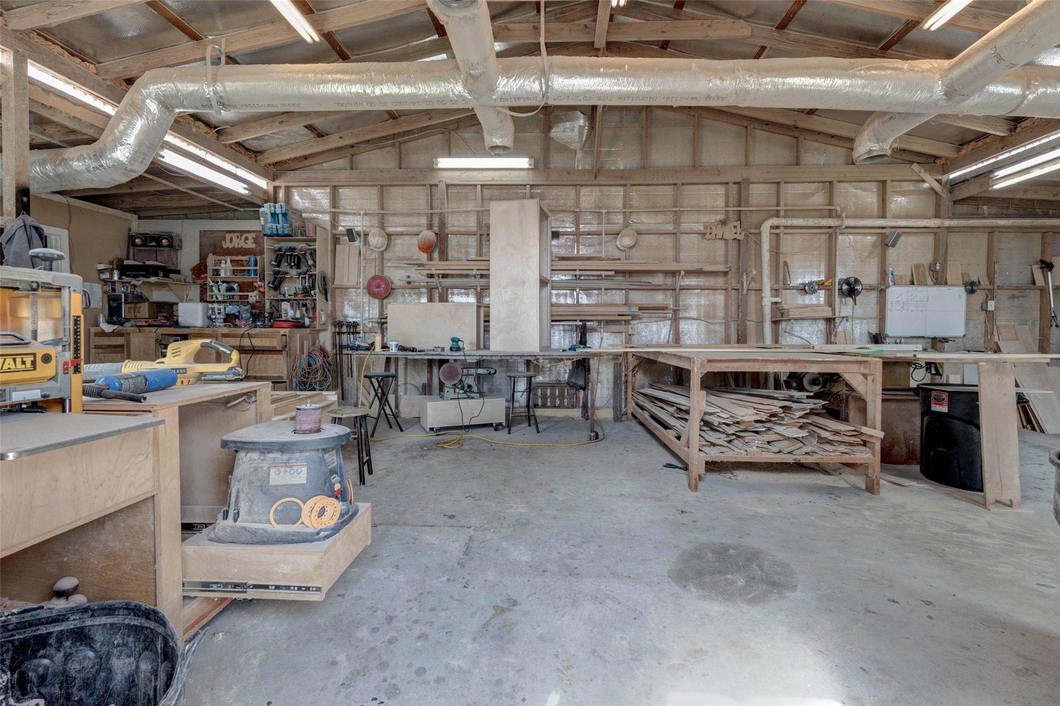 4008 Colvin Street Houston, TX 77013 - Photo 27 of 28 a kitchen with a table and chairs
