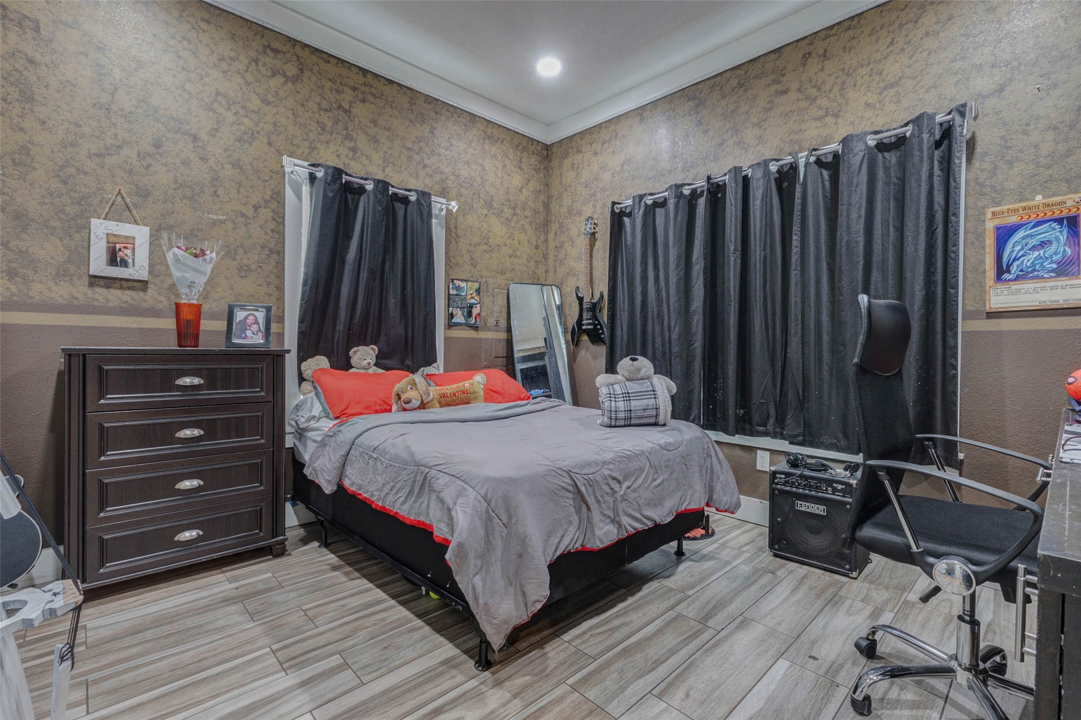 4008 Colvin Street Houston, TX 77013 - Photo 4 of 28 a bedroom with a bed and a mirror