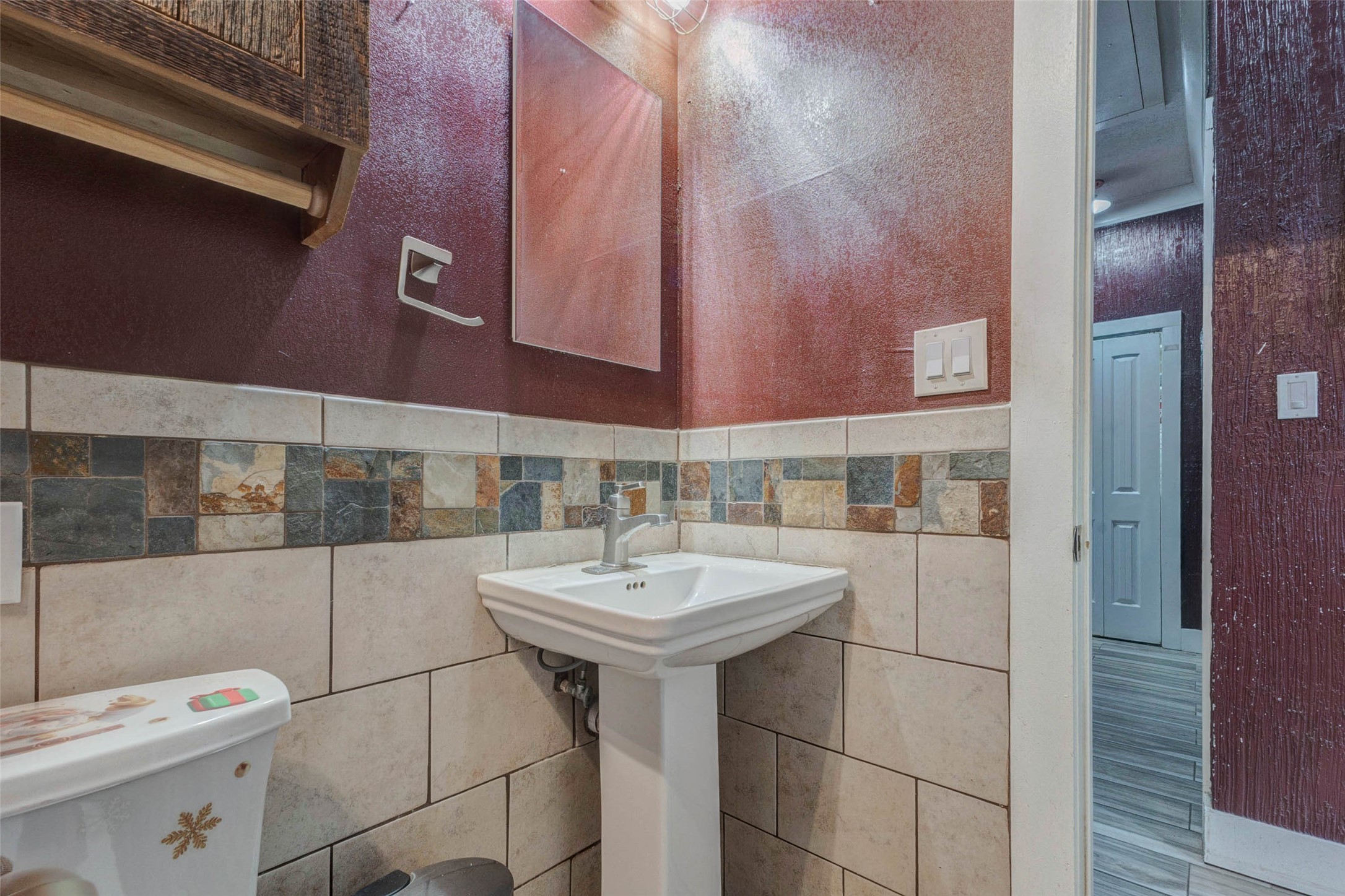 4008 Colvin Street Houston, TX 77013 - Photo 7 of 28 a bathroom with a sink and toilet