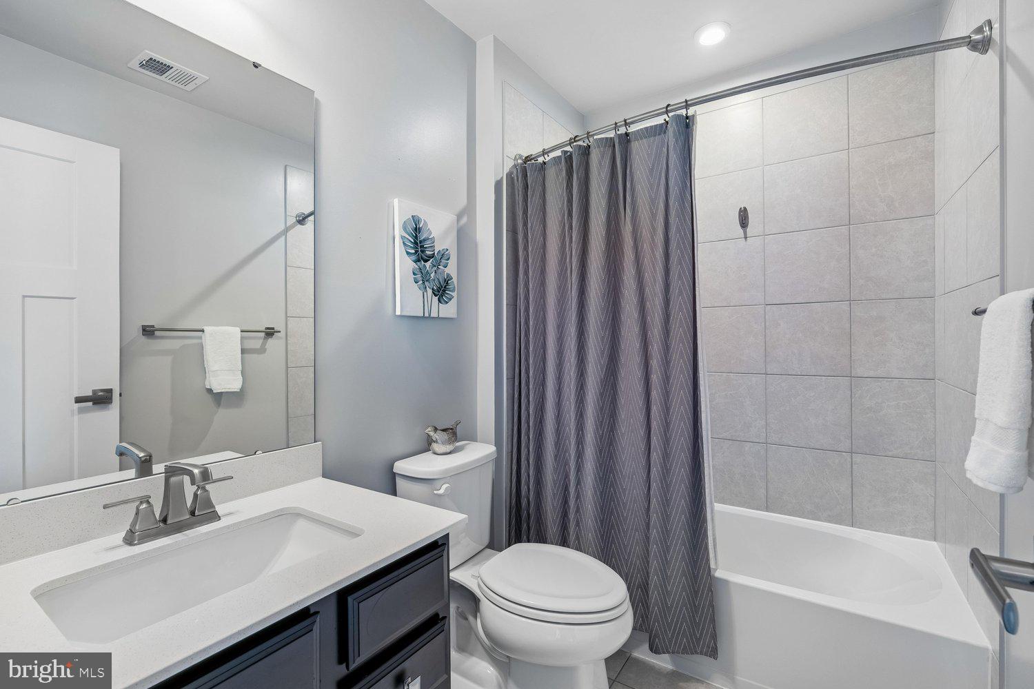 1275 Upper Patuxent Ridge Road Odenton, MD 21113 - Photo 52 of 107 EN SUITE 2ND BA W/ QUARTZ VANITY & TUB SHOWER