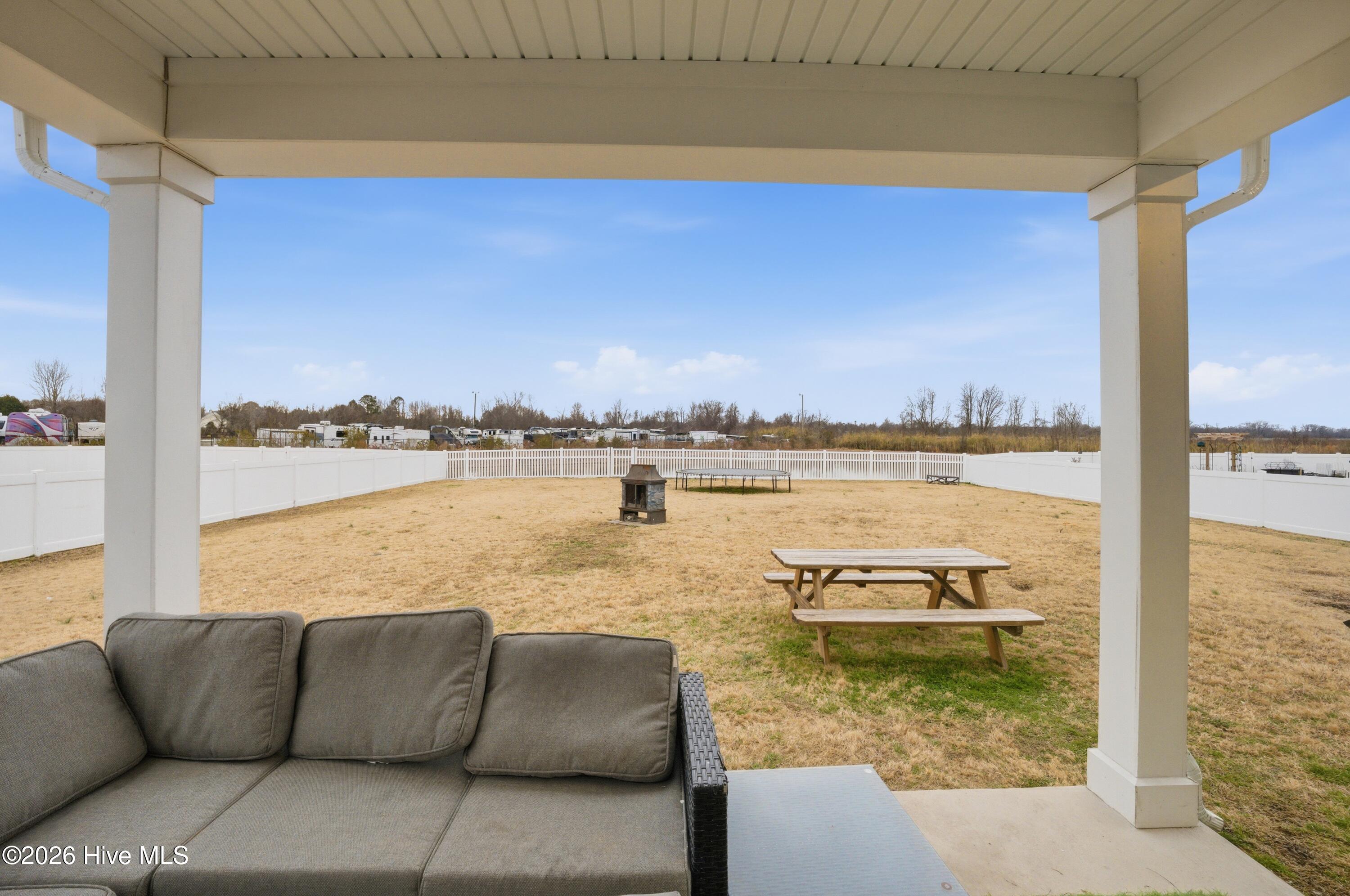 409 Green Lake Road Moyock, NC 27958 - Photo 33 of 53 covered patio with a ceiling fan for those warmer days