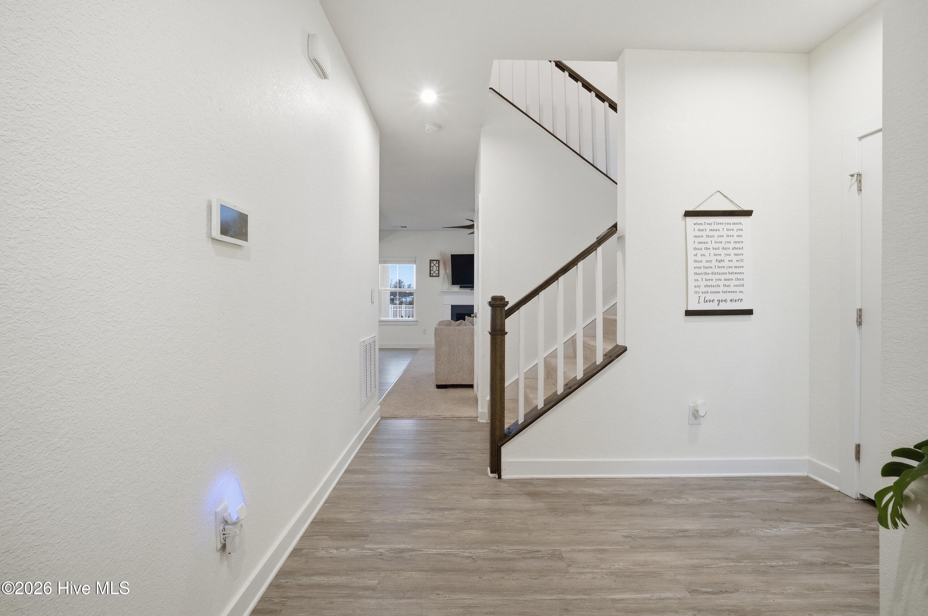 409 Green Lake Road Moyock, NC 27958 - Photo 5 of 53 Staircase at the end of the foyer